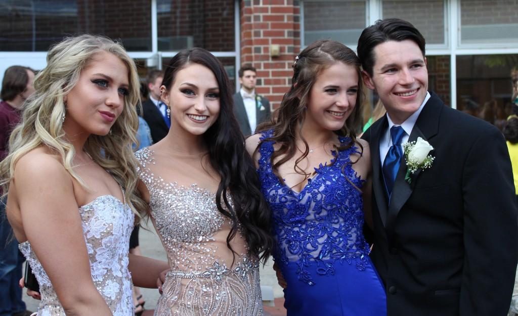 Juniors Alisha Schofield and Emily McLaughlin pose with their friends Sophia Horning and Eric Betti during pre-prom. |Tess McDonald