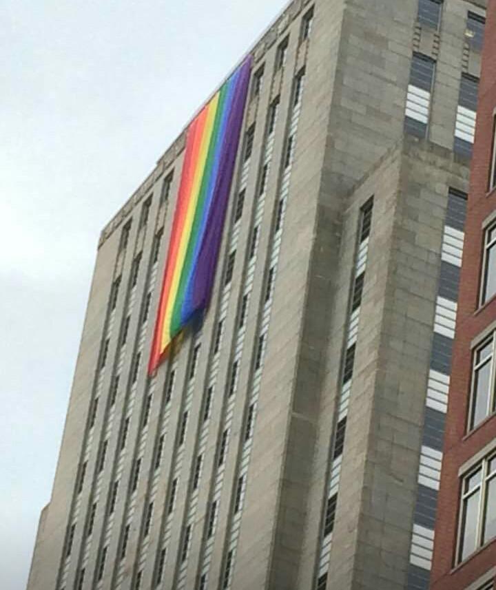 A+large+rainbow+flag+hangs+from+the+The+Berkley+Building+on+Berkley+Street+in+Boston.+The+flag+was+left+hanging+from+the+building+throughout+Saturdays+pride+parade.+%7C+Submitted+Photo