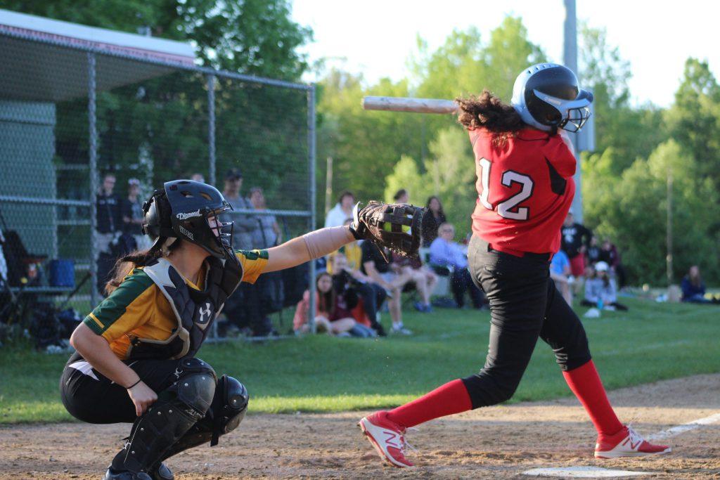 Maddie+Haufe+swings+on+a+pitch+during+the+game.+Haufe+would+later+tie+the+game+with+a+two+run+double+in+the+seventh+inning.+%7C+by+Siobhan+Richards.