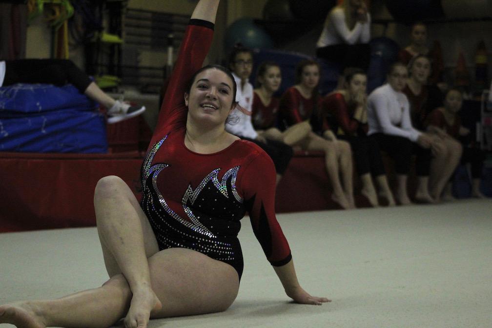 At the gymnastics meet against Marlborough, Kayla Rodrigues performs her floor routine. | by Siobhan Richards 