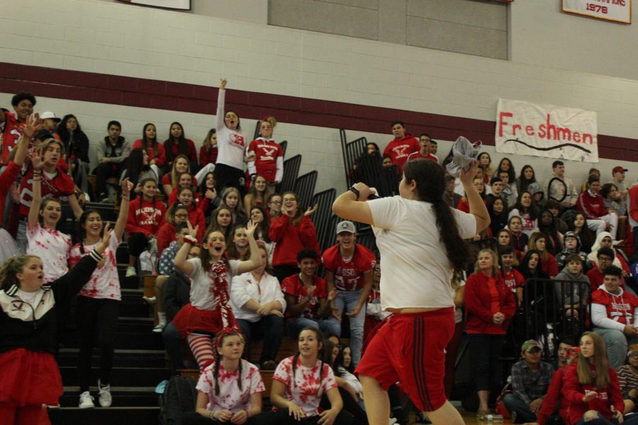 Senior Sienead Resendes throws t-shirts into the Red Sea
