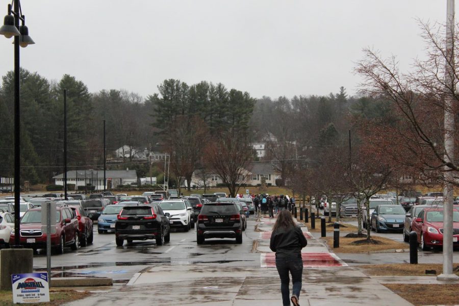 Students gather in the parking lot after walking out |by Camilla Miranda