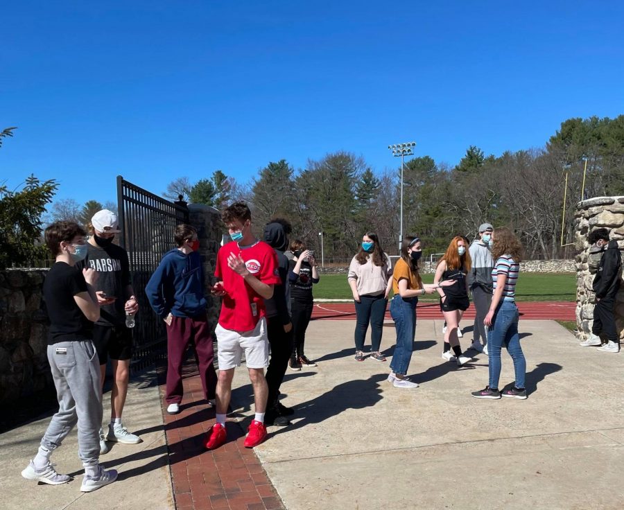 Students take a mask break on Friday. Mask breaks will become more structured and scheduled once students return full time after April Vacation | Photo by The Big Red Staff