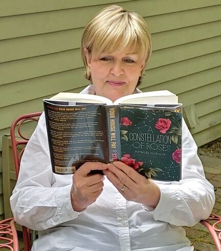 Christine Alexander and books are synonymous. She will continue to enjoy her love of literature in retirement | photo provided by Mary Milette
