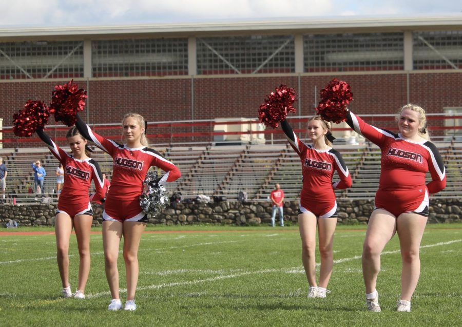 Varsity Cheer opening their routine |by Ella Spuria