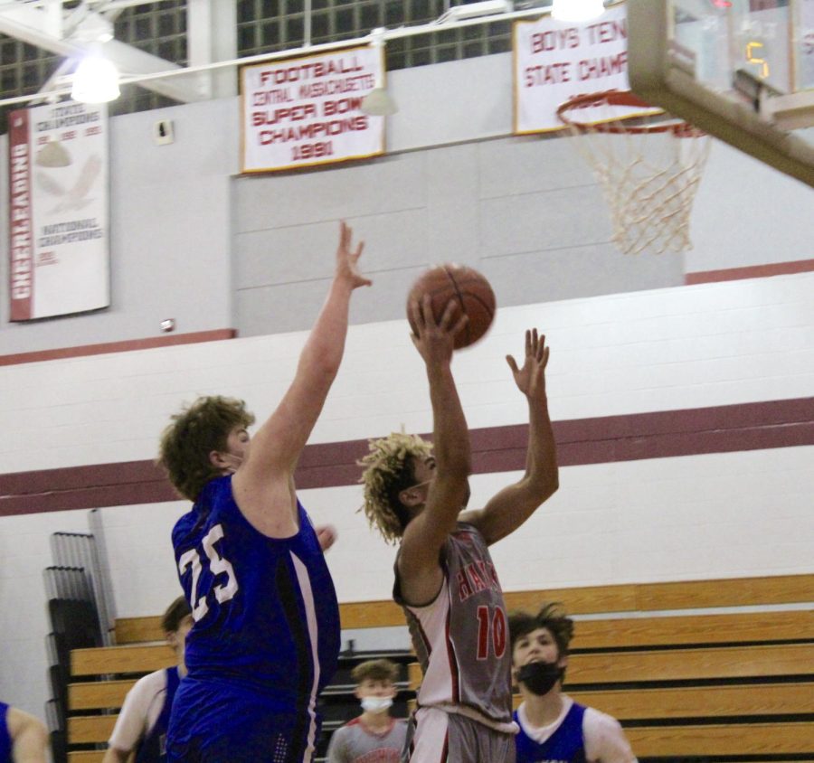 Marcus Bass (10) going up for the shot |by Ella Spuria