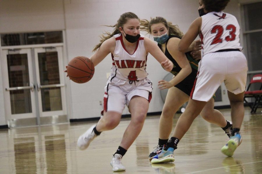 Audrey Lenox (4) dribbling to the opposing basket |by Brianna Devlin