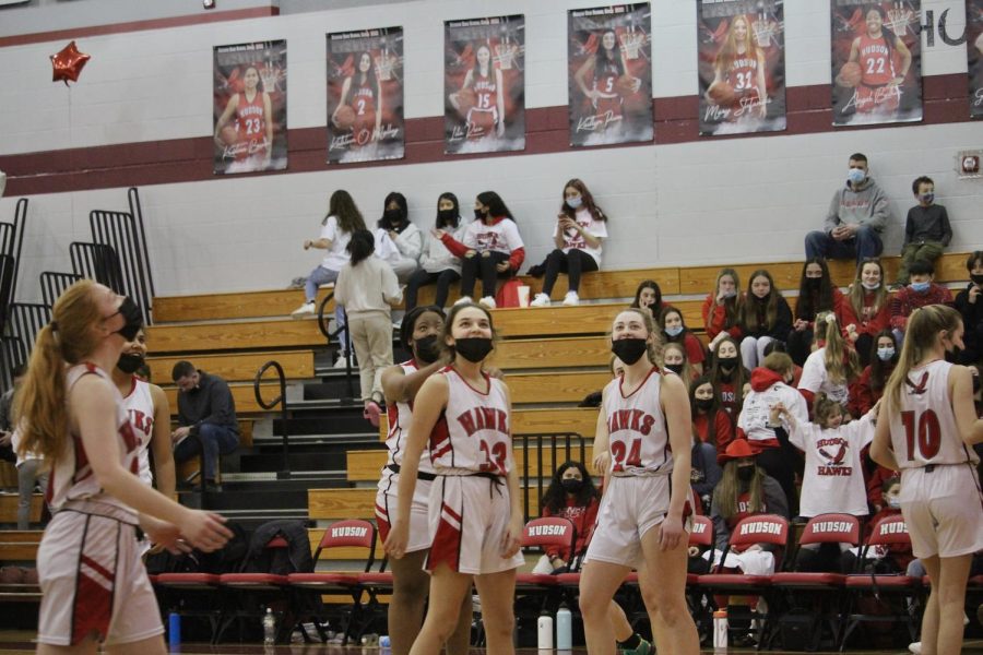 Angel Bethea (22), Sam Collette (24), and Leila Mullahy (33), during halftime |by Ella Spuria