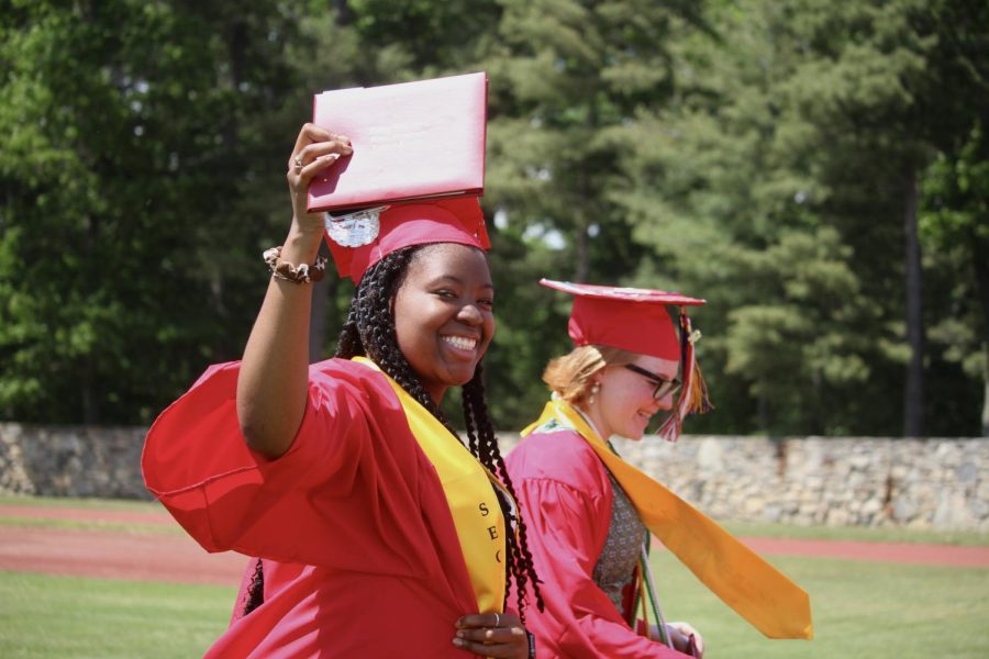Angel Bethea and her diploma |by Ella Spuria