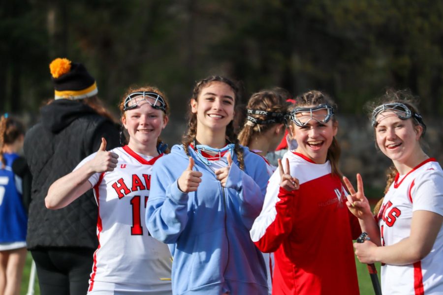Katie Perusse, Hannah Cruciol, Ava Massey, Abbie Becker from the sidelines |by Ella Spuria