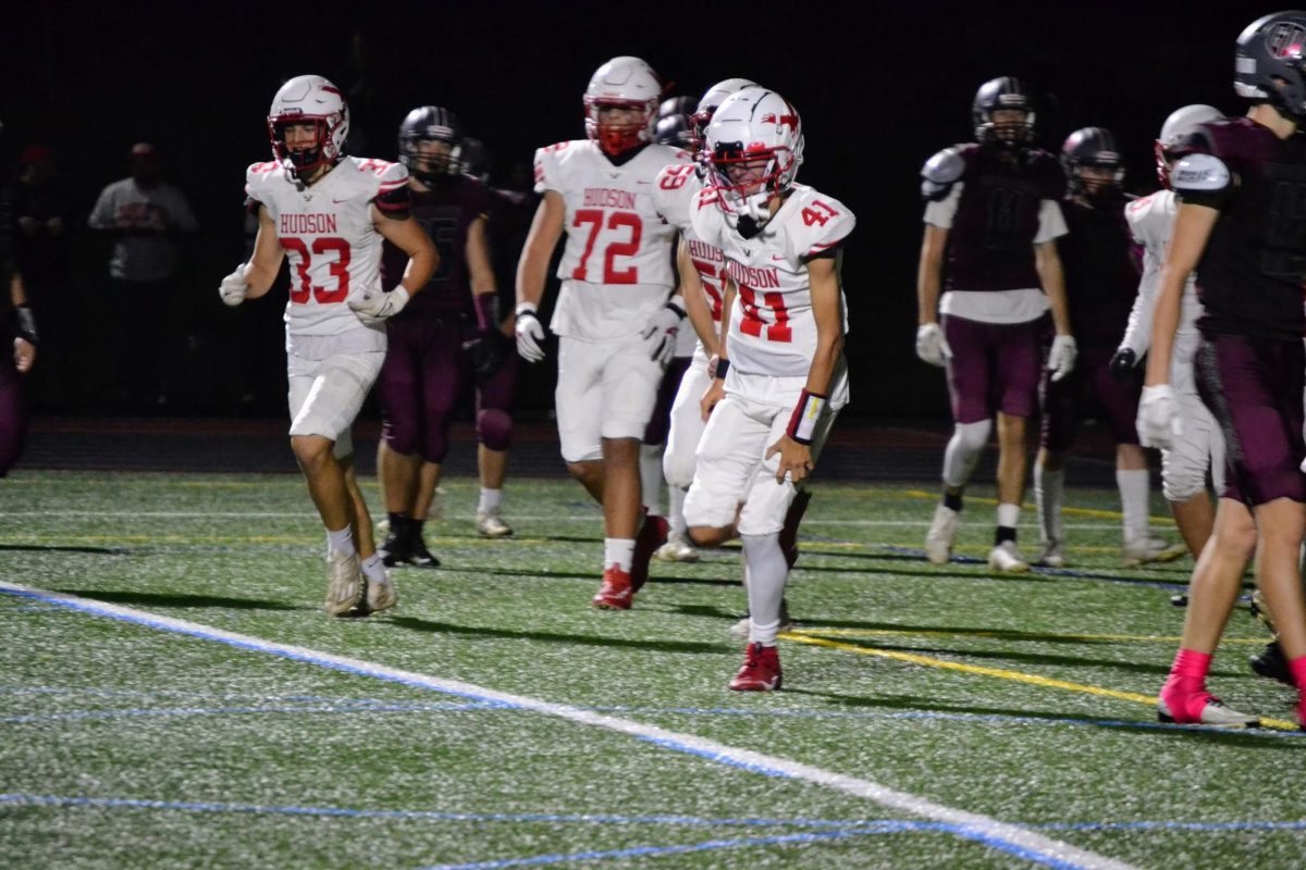 Christian Andrade (41) celebrating after his first Varsity touchdown | by Jason Ford