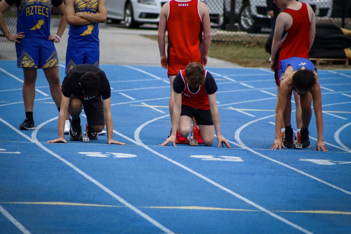 Boys team lined up for the 100 meter |by Ella Spuria