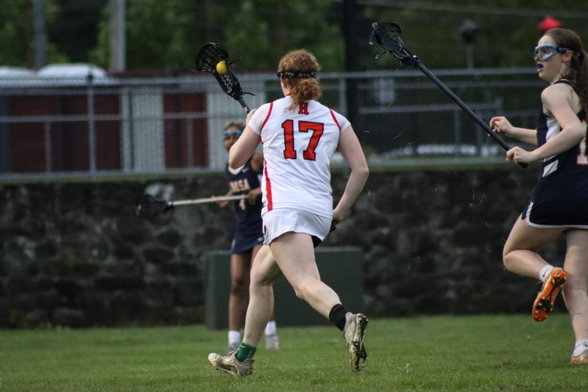 Katie Perusse (17) heads toward the goal |by Ella Spuria