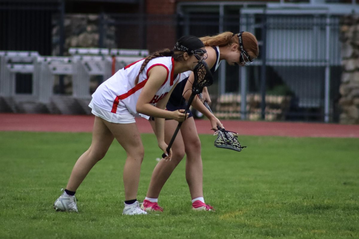 Wing mid-fielders in position for face-off |by Ella Spuria