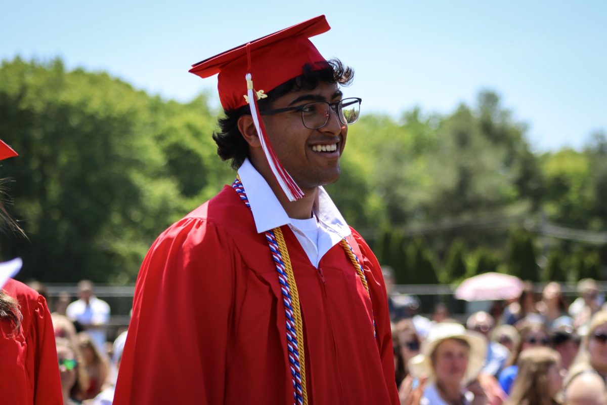 Red Sea Leader Neil Rao gets ready to walk the stage |by Ella Spuria