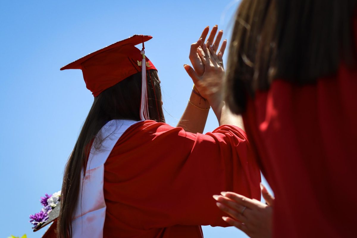 Graduates cheer each other on |by Ella Spuria