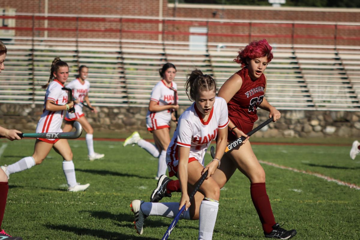 Rudy Wallingford (14), in possession and heading toward the goal |by Ella Spuria