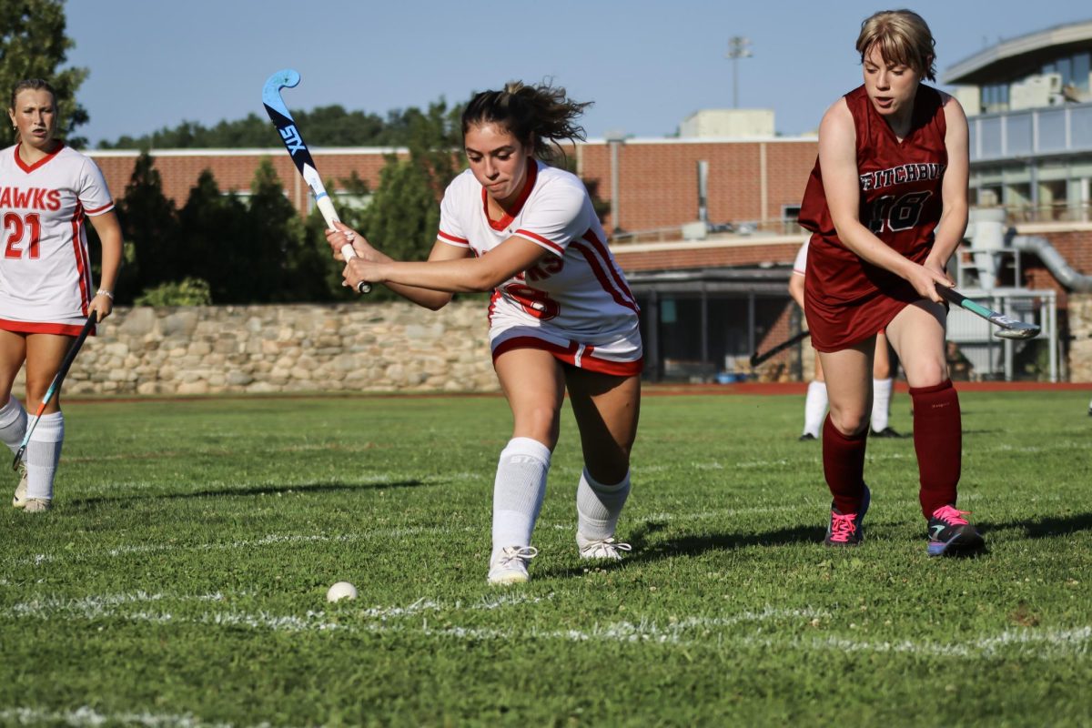 Hannah Cruciol (8), hits the ball to an open teammate |by Ella Spuria