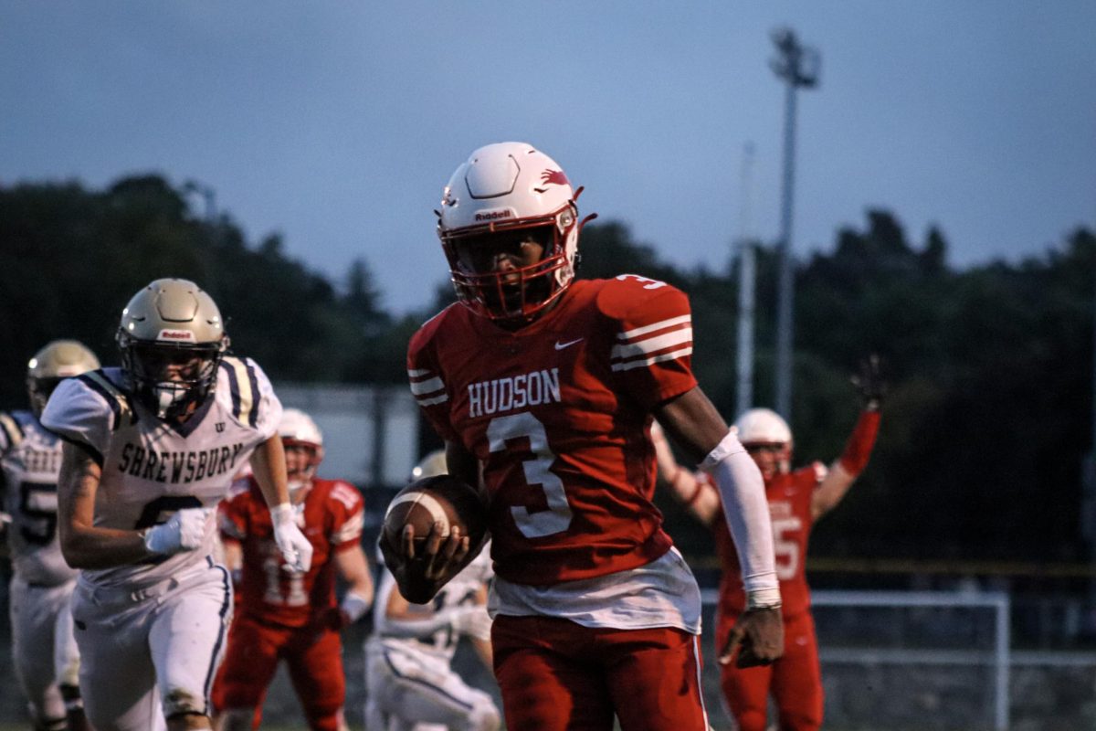 Treson Meuse (3) in possession, heading to the endzone |by Ella Spuria