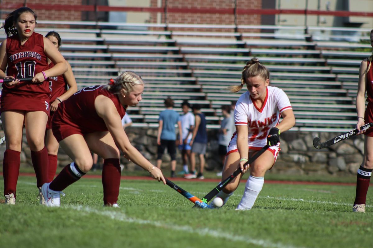 Liv Connolly (13), fights to keep possession |by Ella Spuria