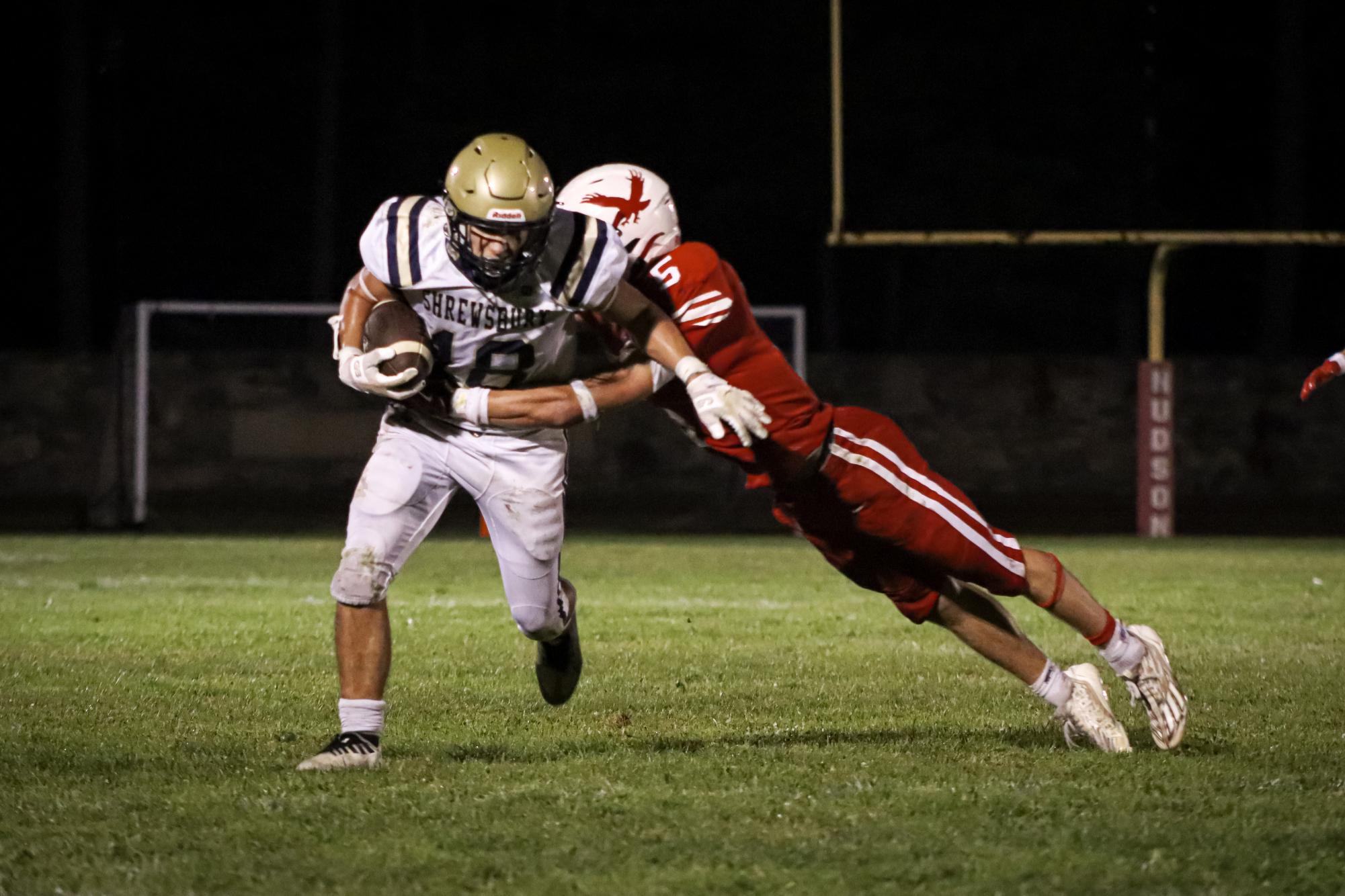 Captain Owen Nanartowich (5) sacks Shrewbury Quarterback |by Ella Spuria