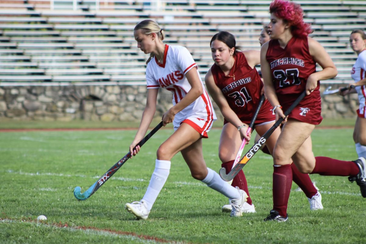 Emma Wood (10), in possession as she attempts to dodge Fitchburg |by Ella Spuria