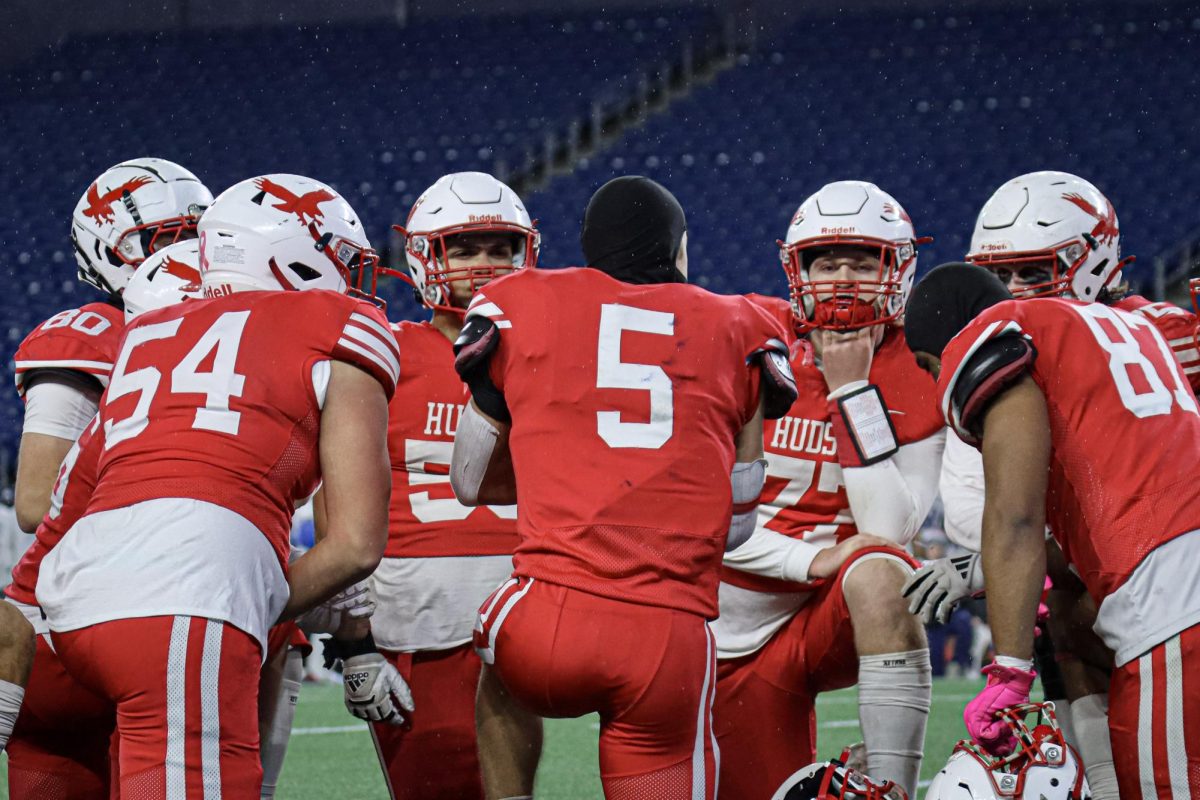 The team huddles up during a time out for an injury on Fairhaven |by Ella Spuria