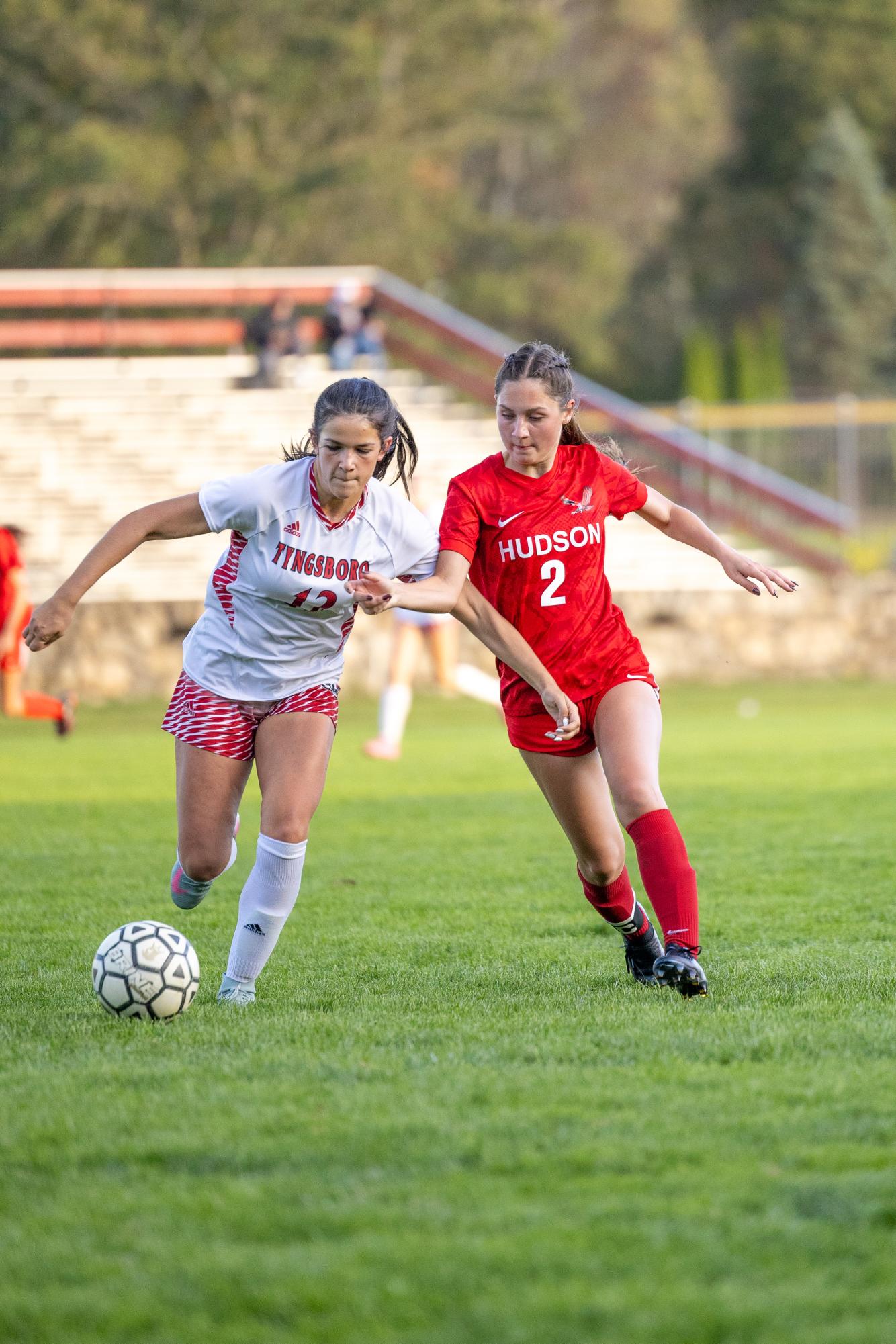 Senior Makenna McGuire going for the ball | by Caden Crogan 