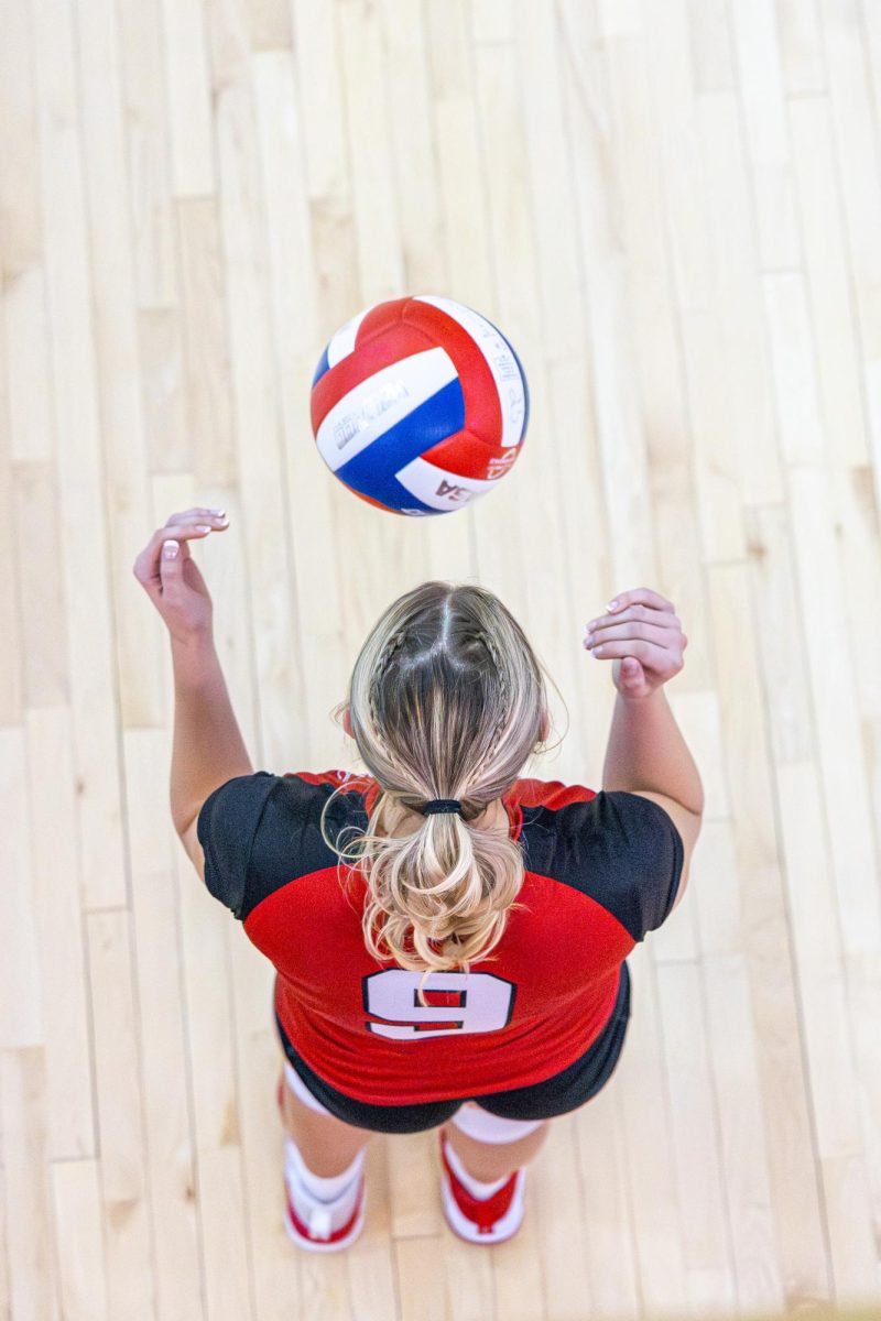 Senior Macey Cooper ready to serve | Caden Crogan 