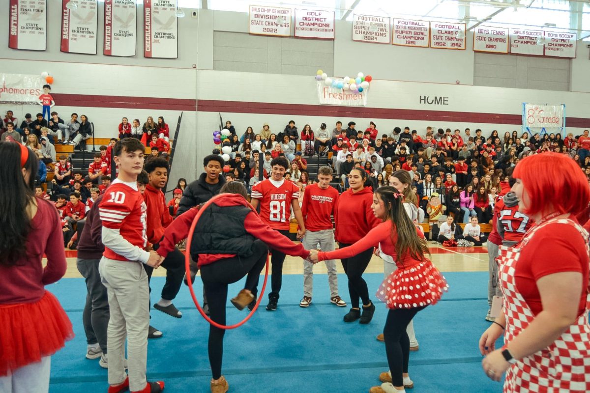 Freshmen team races to get through the hula hoop before the opposing grades | Melanie Person 
