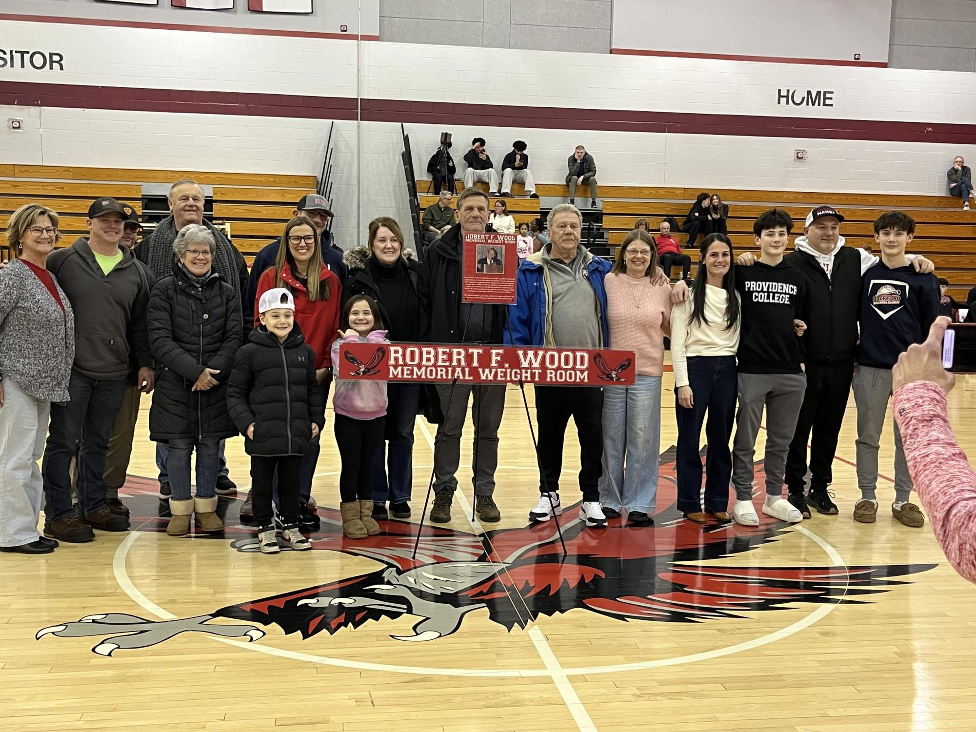 Robert F. Wood's family poses with the dedication plaque | photo provided by Jamie Farrar