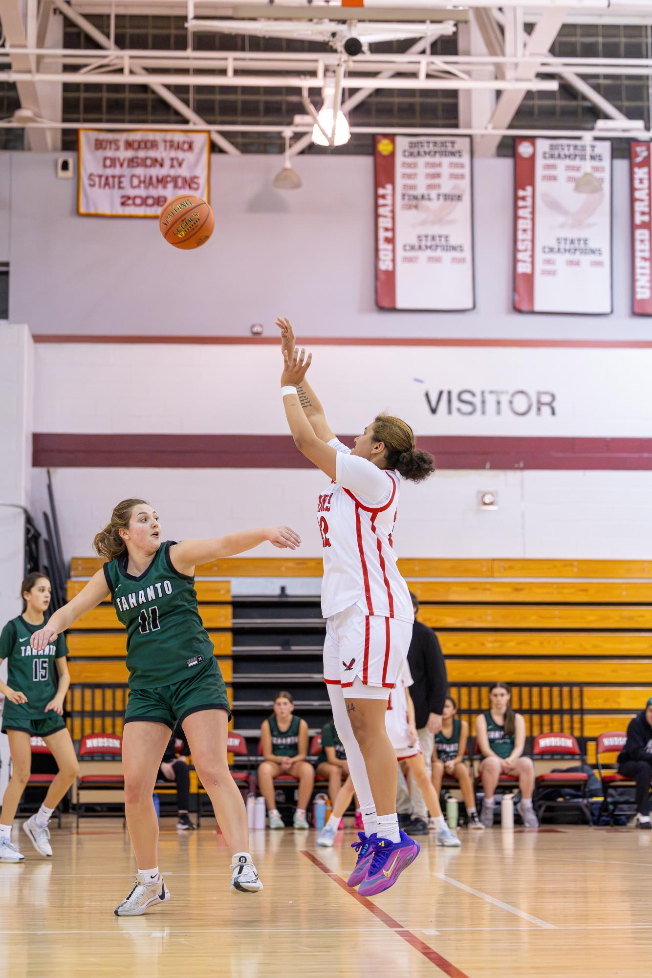 Senior Kristina Bruce taking a jump shot over a Tahanto defender | Caden Crogan